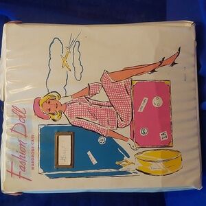 Vintage doll case with clothes